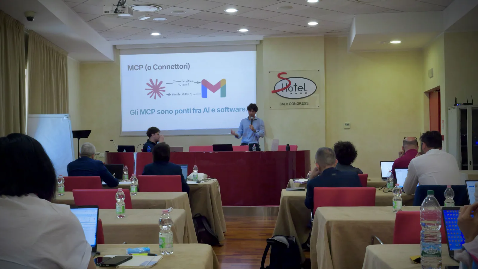 Participants working on their own laptops during on-site training